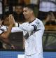 Portugal's Cristiano Ronaldo, right, celebrates with Joao Felix after scoring his side's fourth goal during a World Cup 2026 group F qualifying soccer match between Armenia and Portugal at the Vazgen Sargsyan stadium in Yerevan, Armenia, Saturday, Sept. 6, 2025. (AP Photo/Hakob Berberyan)