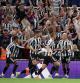 El Newcastle celebra un gol ante el Liverpool